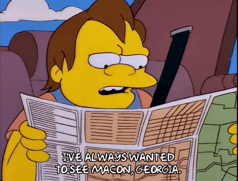Nelson from the Simpsons reading a map saying, "I've always wanted to see Macon, Georgia".