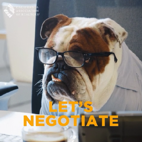 Dog at a desk saying "let's negotiate"