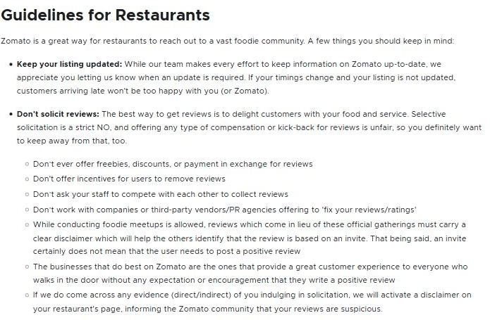 Zomato's Guidelines for Restaurants, headed "Don't solicit reviews", listing prohibitions on offering freebies for reviews, incentives to remove reviews and staff review competitions, and ending with a line saying Zomato will activate a disclaimer on the restaurant's page informing the community that its reviews are suspicious